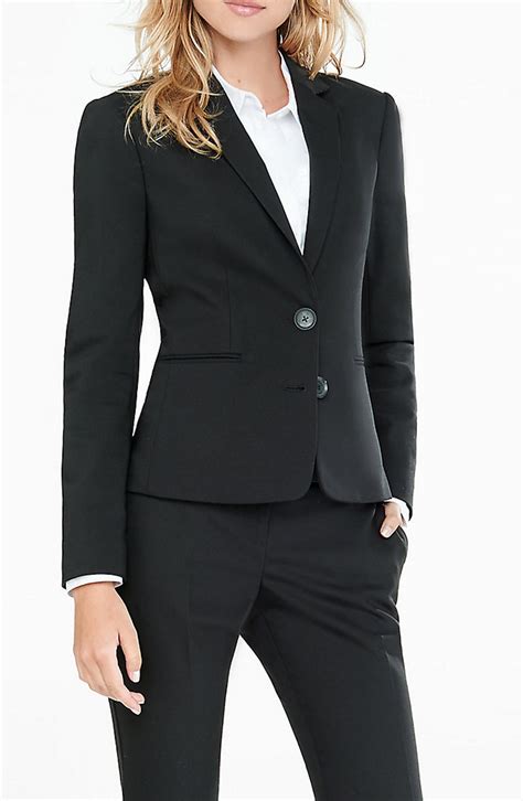 woman in black suit|More.